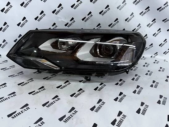 Фара левая Volkswagen Touareg NF (2010 - 2015)