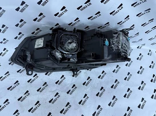 Фара правая Volkswagen Touareg NF (2010 -2014) USA