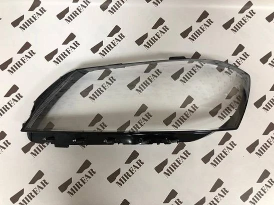 Левое стекло фары Volkswagen Passat B7 2011-2015